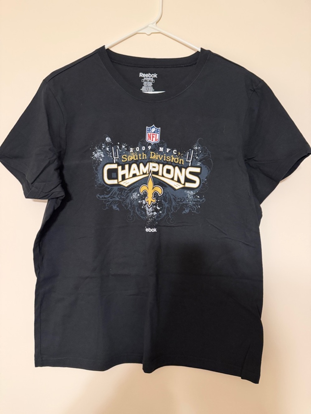 Reebok Black Saints "Champions" Graphic Tee with Gold Accents. NWOT. Size Large
